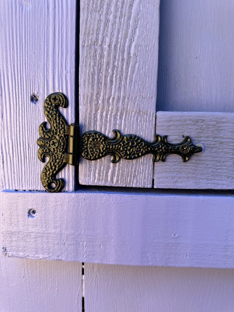 This is a photo of a fancy hinge on the speakeasy door.