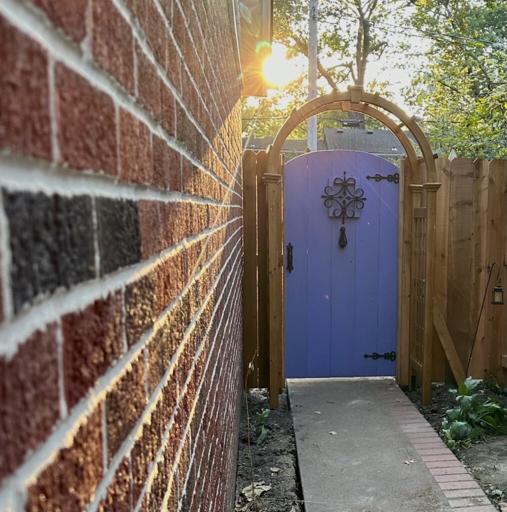 This is Kat's secret garden pathway and door in the sunset as a magical secret garden door example.