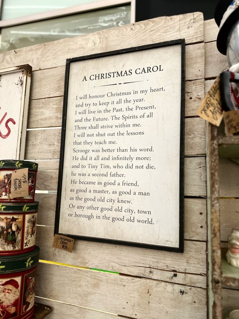 This is a framed quote from A Christmas Carol as an example of best christmas movie quotes.