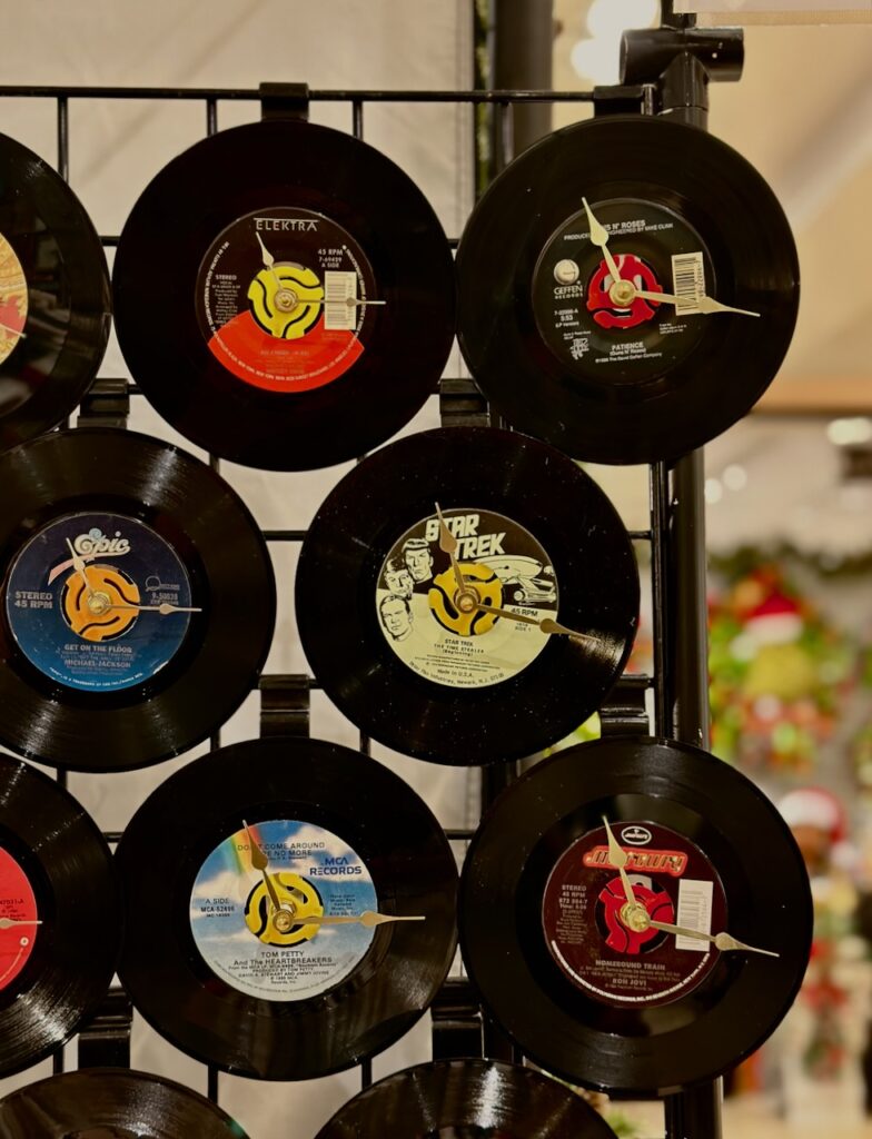 These are vinyl records turned into clocks and a good example of what to buy christmas market decorations.