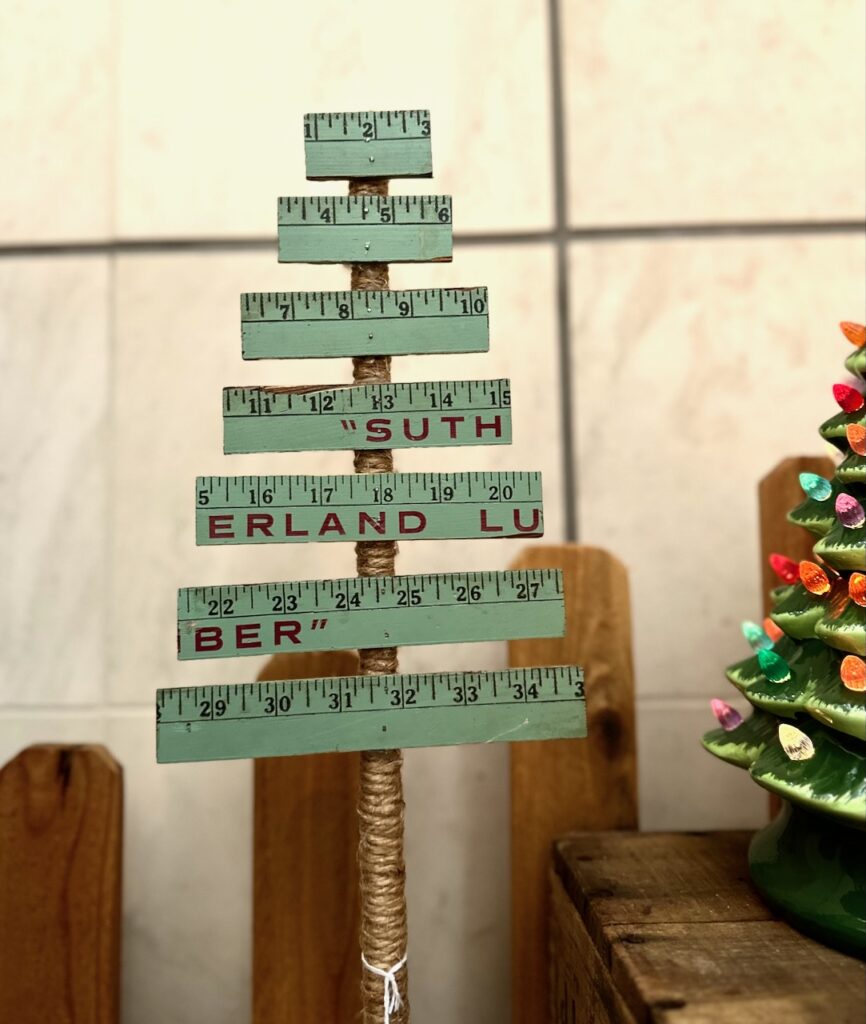 This is a Christmas tree made out of a green ruler and an example of christmas decorations to make yourself.