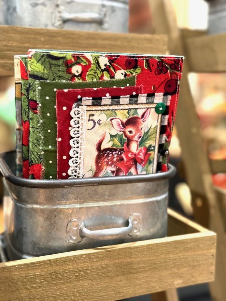 These are fabric-covered journals in holiday colors and prints for easy holiday craft ideas.