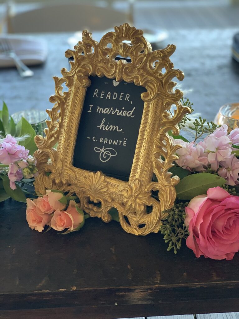 This is a Jane Eyre quote that says, "Reader, I married him" to show an example of environmentally friendly wedding decor.