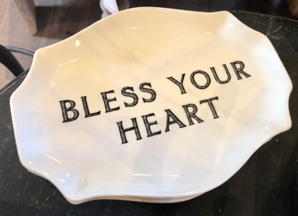 This is a little tray that says "Bless your heart" to discuss good human qualities quotes.