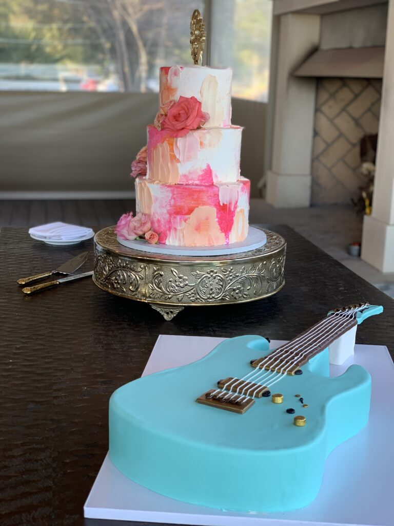 This is Kat's guitar cake to show what's not a super eco conscious wedding.