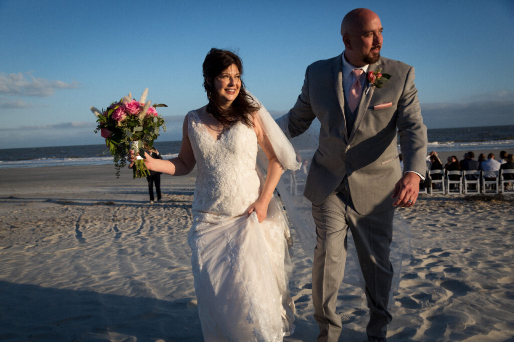 This is Kat and Jon leaving their beach wedding to show beach wedding send off ideas.